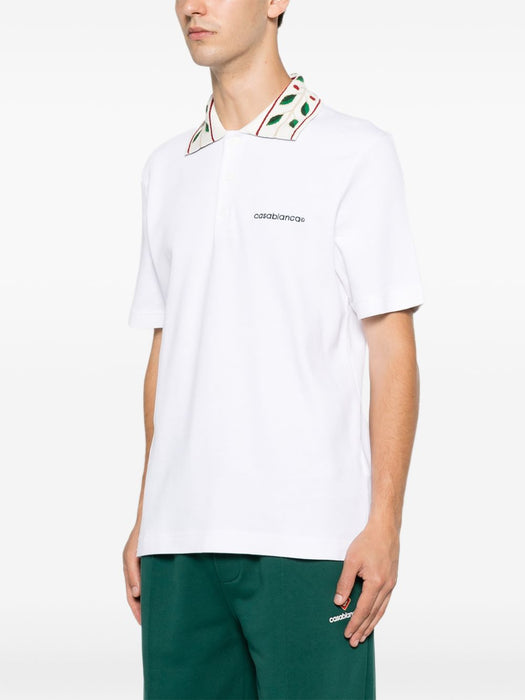 Logo-embroidered polo shirt M-PF26-JTP-499-01  CASABLANCA 
