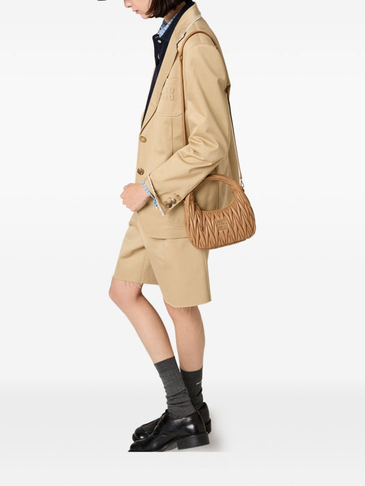 Wander matelassé leather clutch bag 5BC125 V OOY AN88F098L MIU MIU 