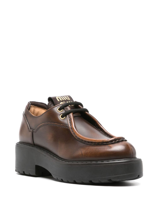 Logo-patch leather loafers 5E964D F 055 3KY8F0038 MIU MIU 
