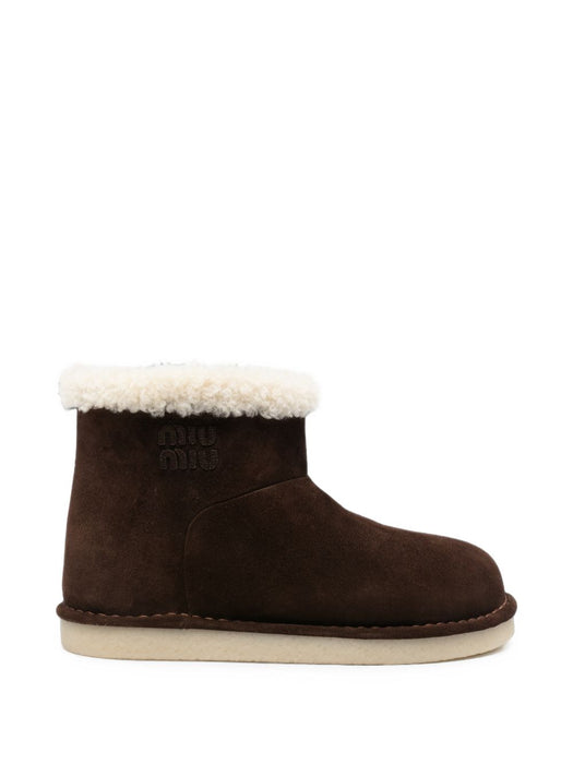 Shearling-trim logo-embossed boots 5T515E F ZF15 Z0GF0003 MIU MIU 