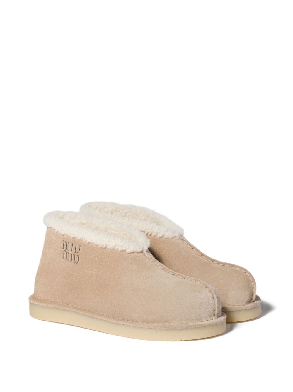 Embroidered-logo shearling boots 5T516E F ZF15 Z0GF0F24 MIU MIU 