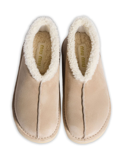 Embroidered-logo shearling boots 5T516E F ZF15 Z0GF0F24 MIU MIU 
