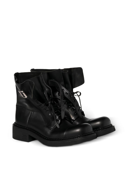 Leather booties<BR/><BR/> 5T741E F 035 5OD F0002 MIU MIU 