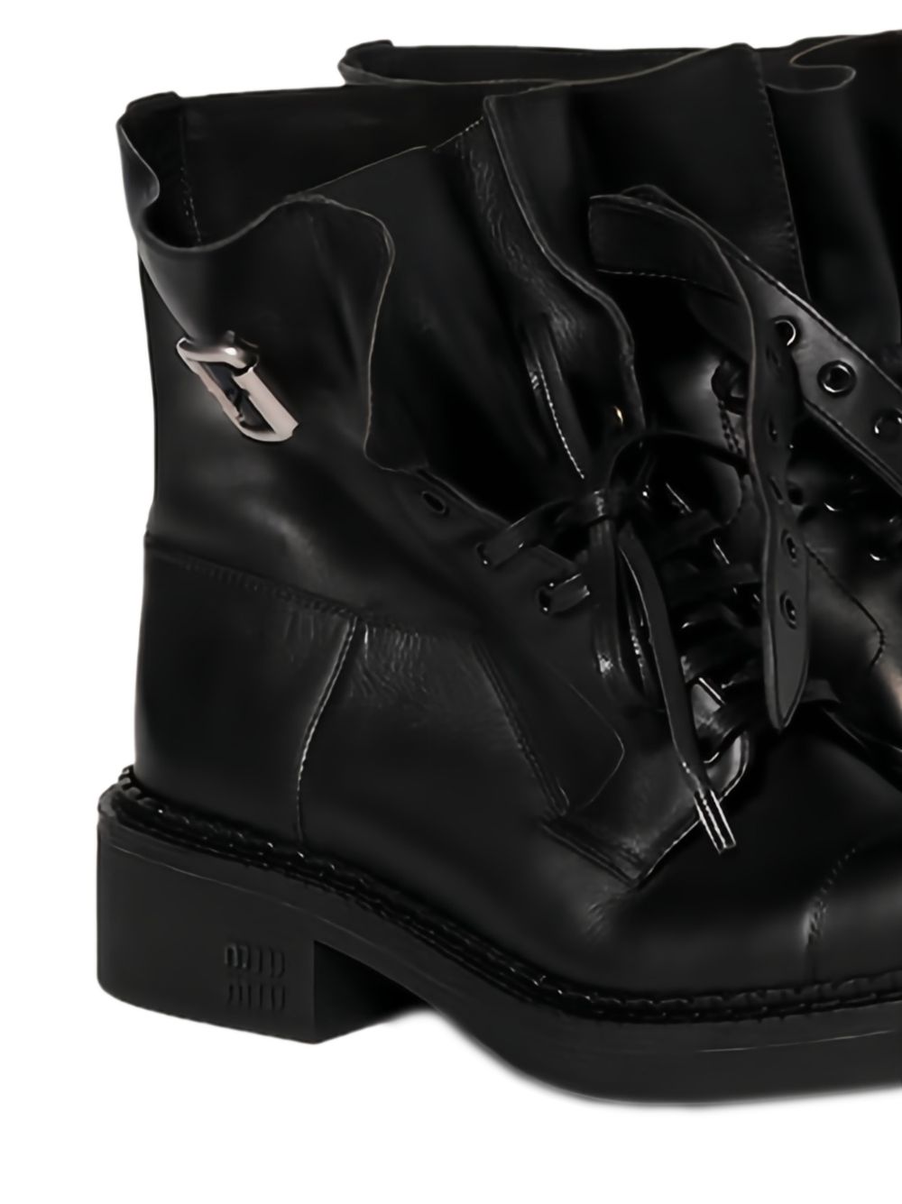 Leather booties<BR/><BR/> 5T741E F 035 5OD F0002 MIU MIU 