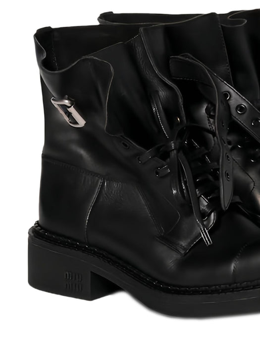Leather booties<BR/><BR/> 5T741E F 035 5OD F0002 MIU MIU 