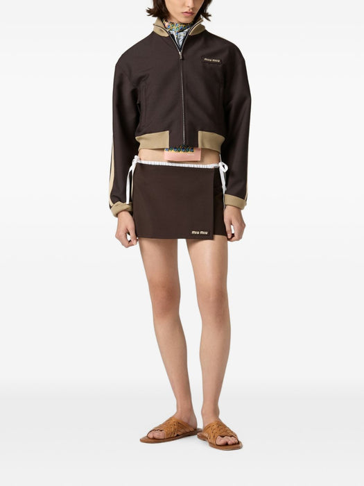 Logo-patch wrap skirt MG2724 S OOO 12I1F0324 MIU MIU 