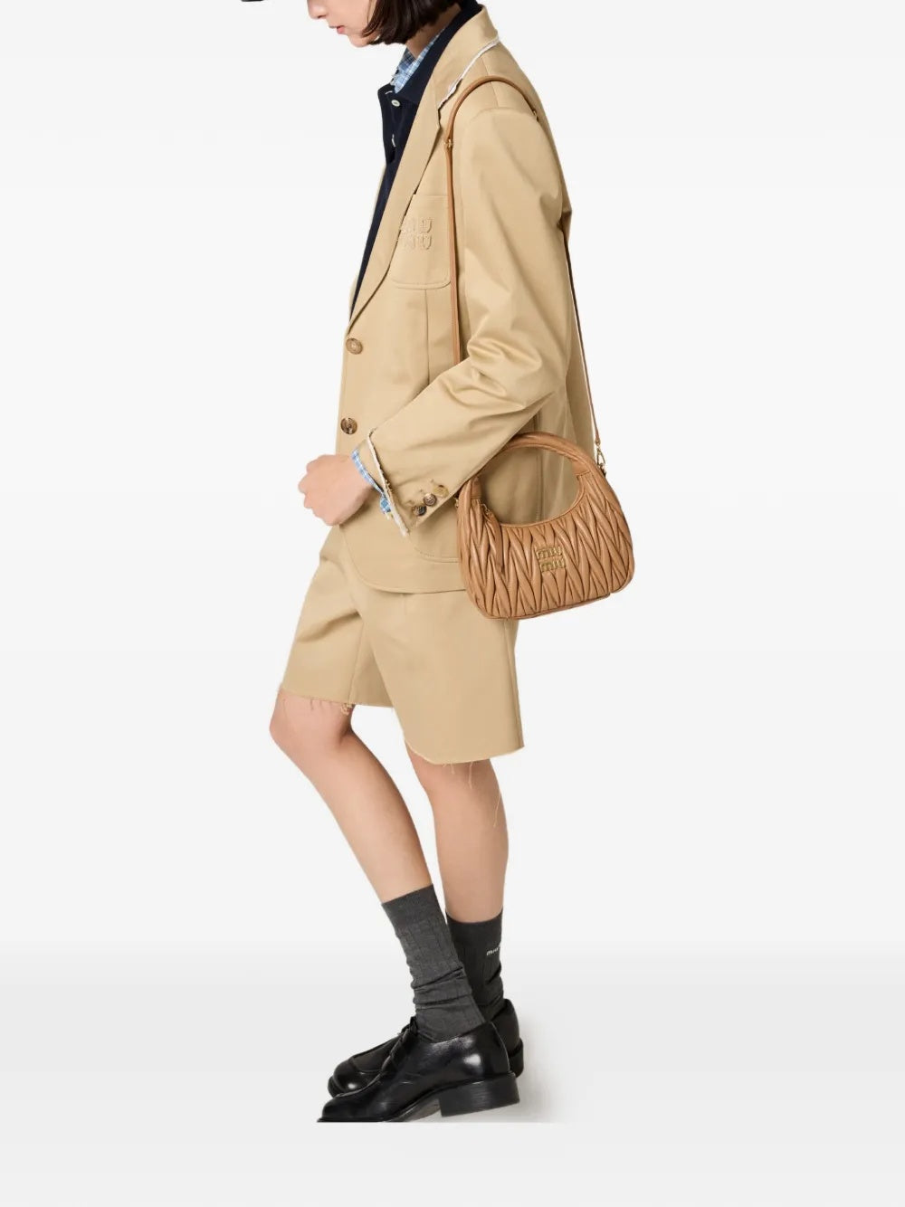 Wander matelassé leather clutch bag 5BC125 V OOY AN88F098L MIU MIU 