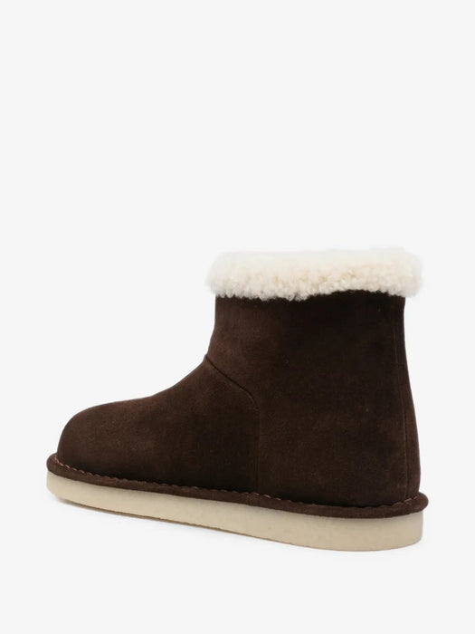 Shearling-trim logo-embossed boots 5T515E F ZF15 Z0GF0003 MIU MIU 