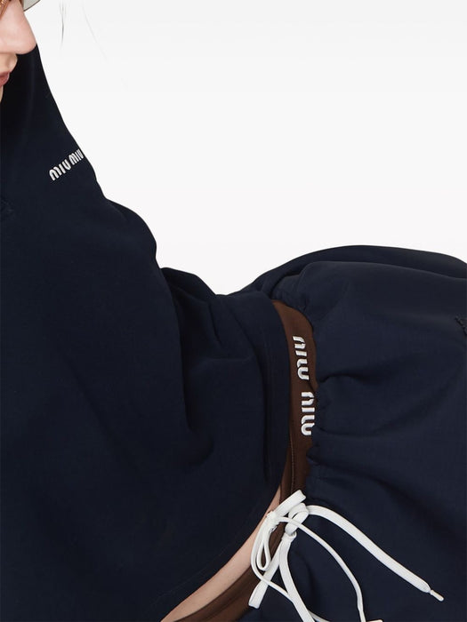 logo-appliqué wool miniskirt MG2200 S-OOO 14Z0F0124 MIU MIU 