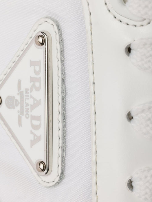 Prax enamel triangle-logo sneakers 2EE443 F G000 3LF5F0009 PRADA 