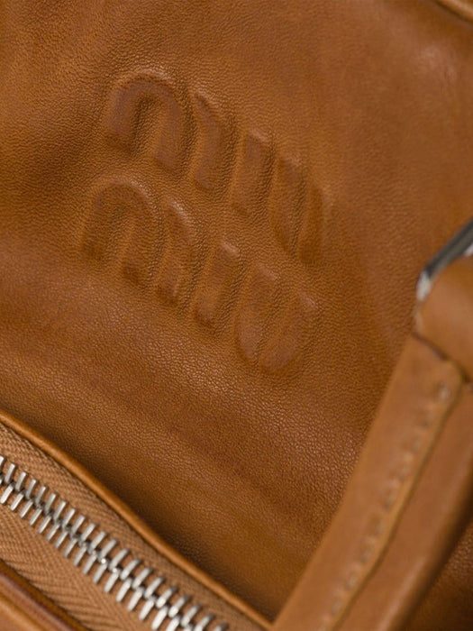 logo-embossed leather tote bag 5BB159 V OOO 2CRLF098L MIU MIU 