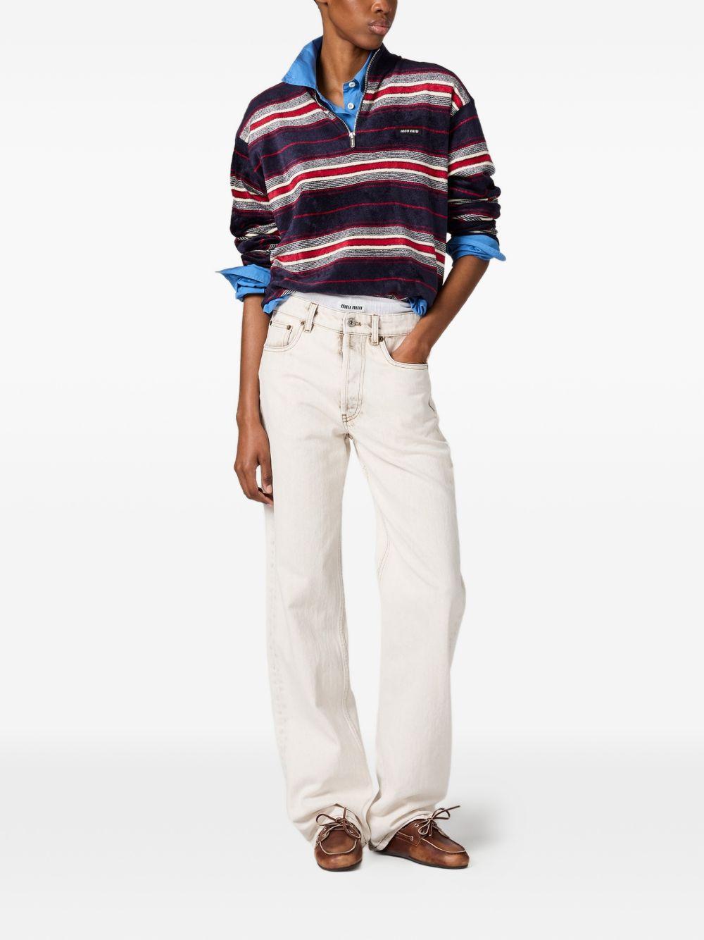 bleached embroidered-logo jeans GWP591 S OOO 183TF0009 MIU MIU 