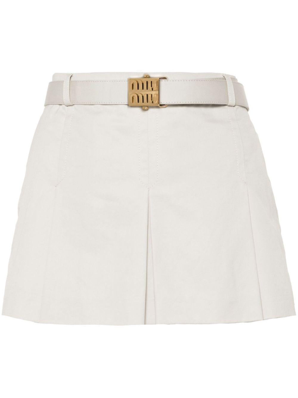 logo-buckle pleated miniskirt MG2258 S OOO 144DF0A08 MIU MIU 