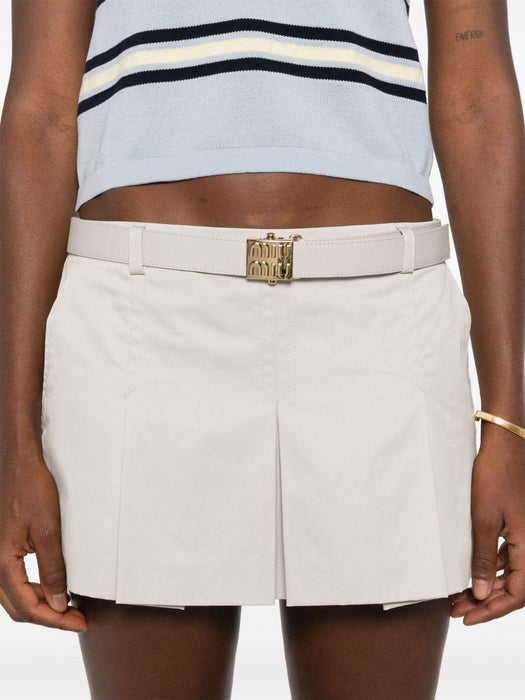 logo-buckle pleated miniskirt MG2258 S OOO 144DF0A08 MIU MIU 