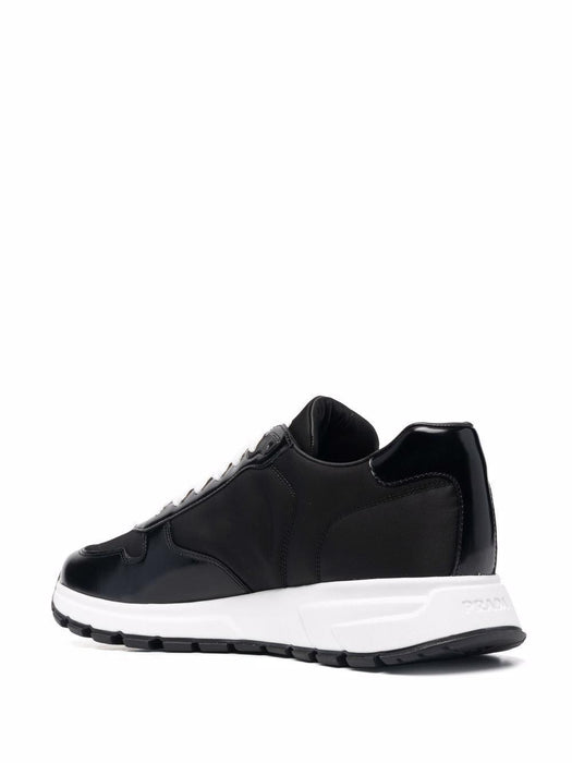 Re-Nylon Triangle-logo low-top sneakers 2EE369 F G000 3LF5F0002 PRADA 