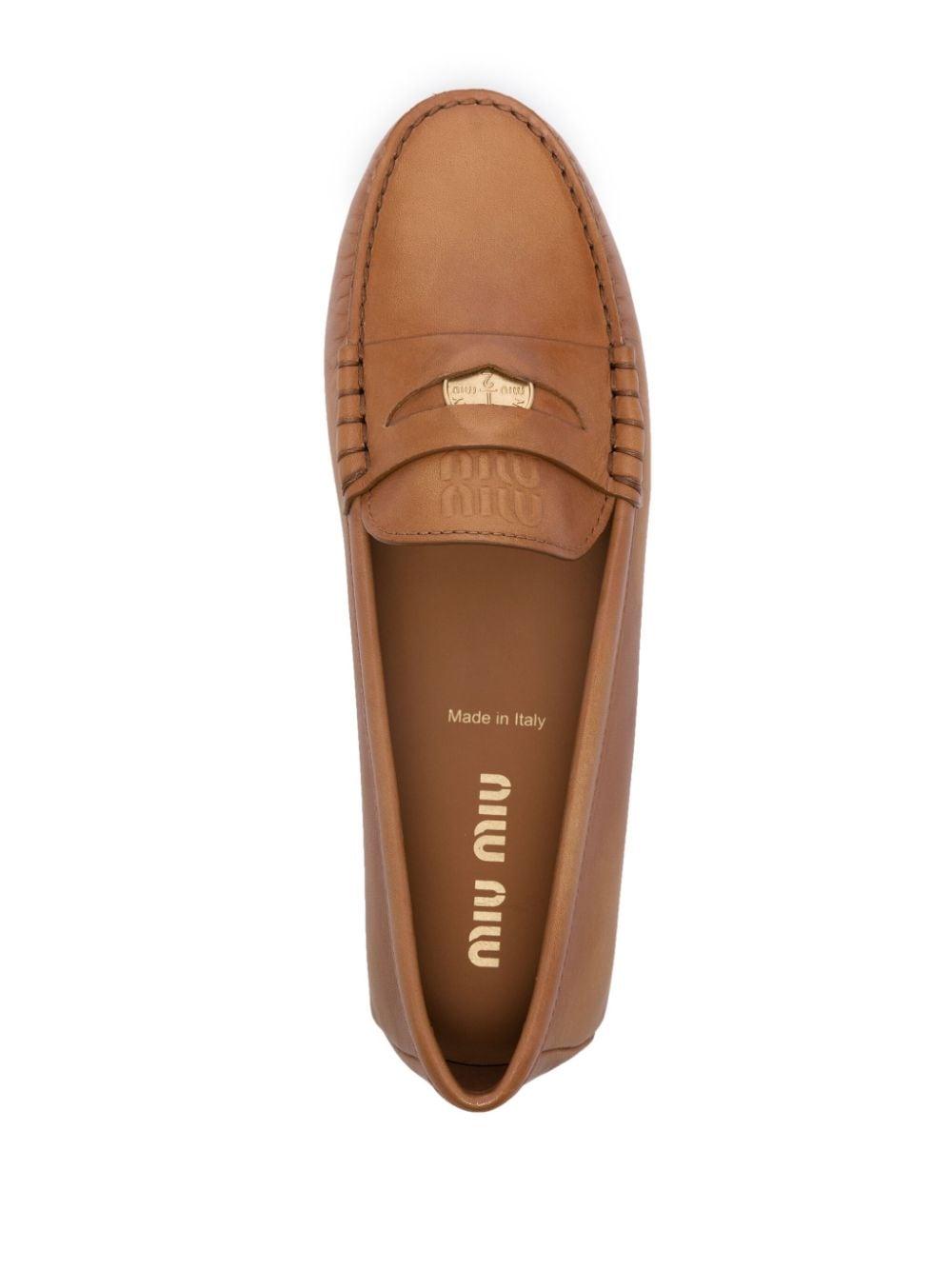 coin-detail leather loafers 5DD022 F 005 3F33F0018 MIU MIU 