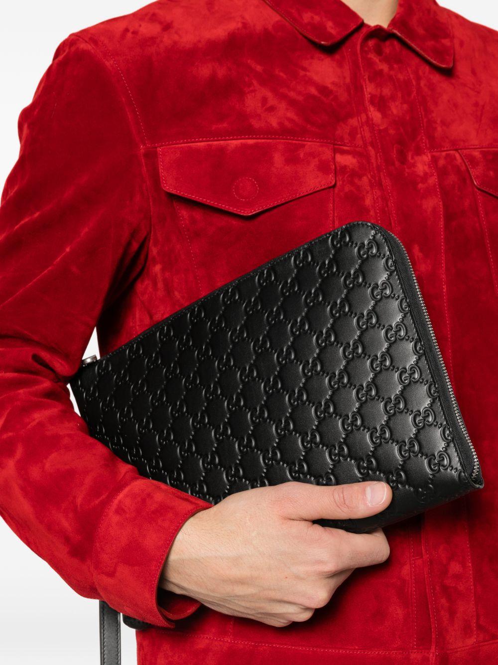 embossed clutch bag<BR/><BR/> 850223 AAFOK1053 GUCCI 